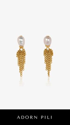 The Aubrey Earrings from Adorn Pili offer a luxury aesthetic, perfect for those who appreciate finely handcrafted pearl earrings. Made with high-quality materials, these elegant pieces add a timeless touch to any look. Ideal for those seeking sophisticated pearl jewelry that combines classic beauty with modern design.