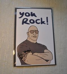 a sticker that says you rock on the side of a wall with an image of a man wearing sunglasses