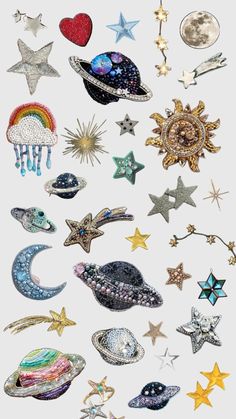 an assortment of different types of brooches and pins on a white background with stars