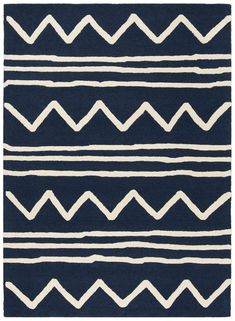 a blue rug with white lines on it