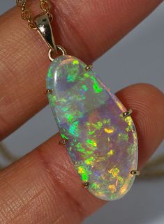 16.60Ct 9Ct Gold 44Cm Necklace With Gem Coober Pedy Opal J09 Luxury Opal Teardrop Necklace, Fine Jewelry With Cabochon Drop, Fine Jewelry Drop Cabochon, Formal Multicolor Opal Jewelry, Luxury Green Opal Jewelry, Opal Drop Gemstone Jewelry, Green Oval High Luster Jewelry, Green High Luster Round Jewelry, Gold Pendant Set