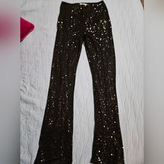 Lined Sequin Pants Nwt. Lined Black Fully Sequined Pants. These Have A Long Length. Very Stretchy. Xs-M Could Wear Full Length Dress Pants For Party, Stretch Full-length Pants For Party, Stretch Full-length Party Pants, Party Full-length Leggings, Fitted Dress Trousers For Party, Fitted Leggings For Party, High Waist Sequin Bottoms For Date Night, High Waist Sequined Pants For Date Night, Stretch Full Length Bottoms For Party Season