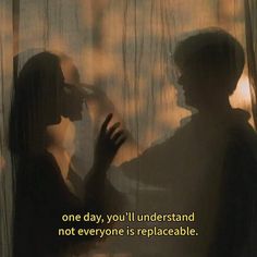 two people standing in front of a window with the words one day, you'll understand not everyone is replaceable