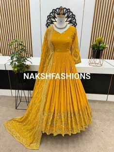 Fabric Detail 🧵  Gown Fabric :Faux Georgette With Full Heavy Embroidery Sequence Work with Sleeve*  Gown Inner : Micro Cotton  Gown Size  : XL(42) With XXL(44) Margin (FULLY STITCHED)  Gown Length : 53-54 Inches   Gown Flair     : 3 Meter   Bottom Fabric : No  Dupatta Fabric : Heavy Faux Georgette and Heavy Embroidery Sequence work and Lace Border     Weight :- 1 kg CARE INTRODUCTION:- HAND WASH / ONLY DRY AND CLEAN Yellow Gown With Dabka Work In Traditional Drape, Wedding Maxi Length Churidar With Dori Work, Wedding Maxi Churidar With Dori Work, Wedding Churidar With Dori Work, Maxi Length, Yellow Georgette Floor-length Churidar, Semi-stitched Yellow Gown With Intricate Embroidery, Yellow Semi-stitched Gown With Intricate Embroidery, Yellow Anarkali Dress With Dori Work, Gold Georgette Gown For Wedding