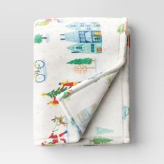 an image of a blanket with the olympic symbols on it's back and white background