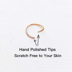 a gold ring with the words hand polished tips scratch free to your skin