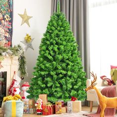 a christmas tree in the corner of a living room with presents and toys around it