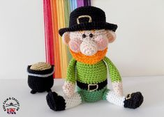 a crocheted lepreite sitting next to a small pot