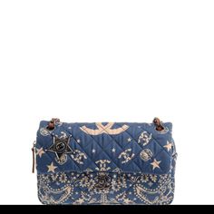 This authentic Chanel Paris-Dallas Bandana Flap Bag Quilted Canvas Medium is from the brand's 2013/2014 Paris Dallas Metiers D'art Bag Collection. Crafted from blue quilted canvas with a motif of paisley, camellias and stars print, this flap bag features woven-in leather chain handles, vintage metal fittings, Sheriff's badge, CC turn-lock closure and aged silver-tone hardware accents. Its turn-lock and zip closures opens to a brown microfiber-lined interior with zip and slip pockets to store you Elegant Blue Quilted Shoulder Bag, Luxury Blue Quilted Bag, Elegant Blue Quilted Bag, T Bag, Girly Bags, Art Bag, Chanel Accessories, Bag Collection, Chanel Paris