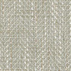 an upholstered fabric textured with white and beige colors, suitable to use as a background or wallpaper