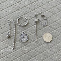 Whether your style is refined minimalist or whimsical maximalist. Asymmetrical earrings are another artful statement to come out with for every taste. ▪️▪️▪️PRODUCTBTS Asymmetric Coin & Bar Dangle EarringDetachable Earring Drops Charms (can be wear just hoops)316L surgical stainless steel (Never Fade and Hypoallergenic)Coin Material is Alloy Height: 7cm / 5.4cm Hoop 12g (2mm) Inner Hoop Size: 13mmOne Pair of Earring ( 2pc )Care instructions: avoid contact with liquids (water, perfume, beauty Masculine Dangle Earrings, Minimalist Stainless Steel Dangle Jewelry, Modern Surgical Steel Single Earring, Modern Stainless Steel Dangle Jewelry, Minimalist Stainless Steel Dangle Hoop Earrings, Trendy Stainless Steel Dangle Earrings, Modern Silver Jewelry With Dangling Charms, Minimalist Single Earring In Surgical Steel, Everyday Dangle Earrings In Stainless Steel