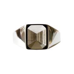 This minimalist signet ring has a carved out emerald cut gemstone shape in the middle.    The sculptural design plays with light and shadow, creating the illusion that a faceted gem is set in the unoccupied space.  You’ll never tire of admiring its clean lines and classic yet modern form.  The ring has a good weight to it, its designed for men and women, and can be worn on the main finger or as a pinky ring.  The ring is made of recycled sterling silver. All No 13 jewellery is made from recycled sterling silver. When not being worn, we recommend that you store your jewellery in the box that it came in. This will minimise the effects of sunlight and the environment. Avoid all contact with water, body lotions, perfumes, sun creams, cleaning products and make-up To keep your jewellery sparkli Emerald Signet Ring, Mens Signet Rings, Water Body, Signet Ring Men, August Birthstone Jewelry, Silver Signet Ring, July Birthstone Jewelry, Body Lotions, Jewelry Ring Box