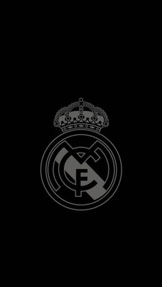 the real madrid logo on a black background