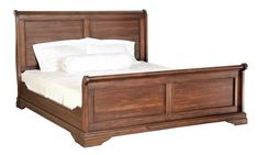 a wooden bed frame with white sheets and pillows