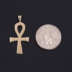 This vintage pendant (circa 1980-1990) features an ankh of 14k gold. The piece measures 1.5 inches from the top of the bail to bottom by 0.7 inches wide, and it is in very good condition. Materials: 14k gold. Vintage Engraved Ankh Jewelry, Antique Gold Ankh Jewelry, Egyptian Hieroglyphics Symbols, Ancient Egyptian Hieroglyphics, Ankh Pendant, Egyptian Hieroglyphics, Vintage Pendant, Ancient Egyptian, Gold Pendant