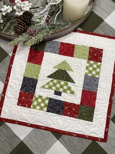 a quilted christmas tree on top of a table with the words instagramn above it