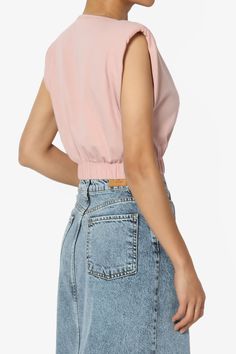 Elevate your weekend casual look with this modern, sleeveless Padded Shoulder Cotton Jersey Blouson Crop Tank Top.A perfect blend of comfort and style, this slim-fit top features a round neck, solid color, and an elastic waistband for a flattering silhouette.Ideal for summer, its lightweight fabric ensures breathability.Pair it with high-waisted jeans or shorts for a chic ensemble.Padded Shoulder Crop Top: A chic, sleeveless design that adds an edge to your outfit.Cotton Jersey Comfort: Soft, breathable fabric perfect for all-day wear.Elastic Waist Blouson: Creates a flattering, cropped silhouette for a touch of modern elegance.Versatile Style: Ideal for pairing with high-rise denim or skirts, transitioning seamlessly from day to night.Model size : 5'3" height, 33" bust, 24" waist, 34" hip Spring Solid Color Sleeveless Blouse, Spring Sleeveless Blouse In Solid Color, Solid Color Tank Top For Spring, Spring Season Solid Color Tank Tops, Spring Crew Neck Vest Top, Chic Cotton Tank Top In Solid Color, Trendy Cotton Sleeveless Blouse Crop Top, Chic Solid Color Cotton Tank Top, Slim Fit Top