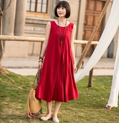 "This red linen dress has a special design. It has different styles. You look even more mod and fashionable in this dress with belt. While, without the belt, it gives a loose and relax looking. It will be your wise choice. Your wardrobe needs it. DETAIL * Made of linen, Eco friendly option , luscious fabric, the material is strong yet still flows. * Pleated A line dress * red high loose waist * crew neck line * Two side pockets * Tie belted dress * Sleeveless dress * Midi length * Perfect for su Red Cotton Sleeveless Vacation Dress, Red Cotton Sleeveless Sundress, Red Sleeveless Sundress For Summer, Casual Red Linen Beach Dress, Casual Red Cotton Sleeveless Dress, Red A-line Dress For Picnic, Red Linen Bohemian Dress, Red Linen Summer Beach Dress, Red Bohemian Linen Dress