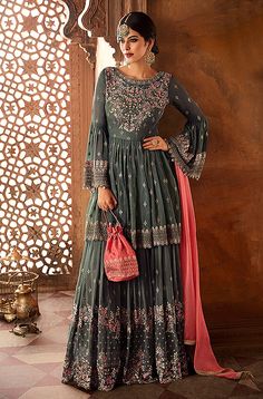 COLOR : Gray & Coral Pink FABRIC : Top - Georgette, Inner - Santoon, Bottom - Georgette, Dupatta - Chiffon WORK : Heavy Resham Embroidery, Zari Work, Stones, Beads, Lace Border OCCASION : Wedding, Reception, Party Wear, Festival READY-TO-WEAR : No STITCHING : Available as semi-stitched fabric, can be stitched using standard size option (+$20). Note: There might be a slight color variation due to lighting and flash used during photoshoot. The bright shade seen is the best closer view of fabri Georgette Sharara, Wedding Reception Party, Sharara Designs, Resham Embroidery, Sharara Suit, Desi Clothes, Reception Party, Indian Bridal Outfits, Dress Indian Style