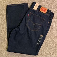 Dark Blue Wash, No Distressing Relaxed Jeans With More Room Than The Levi's 501 Roomy Fit Loose Through The Seat And Thigh Sits At Your Waist Tapered Leg 100% Cotton Non Stretch Zip Fly 5-Pocket Styling Size: 42 Waist X 32 Length Nwt! Offers Welcome! Bundle To Save! Smoke + Fragrance Free Home! Same Or Next Business Day Shipping! Levi Baggy Jeans, Levis Jeans Men, Khaki Corduroy Pants, Estilo Cholo, Blue Jeans Mens, Levis 550 Jeans, Levi 501, Black Levis, Dad Jeans