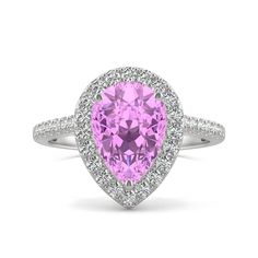 a pink heart shaped diamond ring with diamonds around the band and an oval cut center