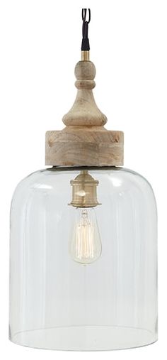 a clear glass and wood pendant light