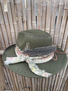 Decorated wide brimmed fedora hat will complement any outfit! With a western boho style, this hat can be for both casual and formal.  This hat has been burnt and hand stitched to give it a unique distressed appearance . Hand made hat-bands include a one of a kind design using an assortment of fabrics, premium leather and real feathers.  Please feel free to message me with any customization requests. These are quite literally completely customizable. One Size Fits MOST. 22 3/8 circumference inner Country Style Hats For Fall Events, Country Style Hats For Fall Country Events, Country Style Felt Hat For Fall Events, Western Brimmed Fedora For Fall, Western Style Brimmed Fedora For Fall, Wide Brim Hat For Western-themed Fall Events, Country Style Fedora For Fall Rodeo, Country Style Fedora For Rodeo In Fall, Western Wide Brim Fedora For Fall