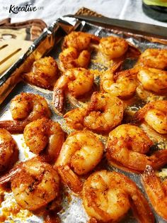 cooked shrimp on a baking sheet ready to be served