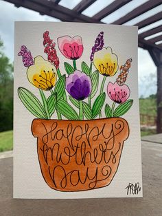 a card with flowers in a pot that says happy mother's day on it