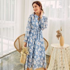 Material: PolyesterSilhouette: LooseAge: Ages 18-35 Years OldModel Number: S20DR7398Season: SummerNeckline: O-NeckSleeve Length(cm): FullSleeve Style: Flare SleeveGender: WOMENDecoration: SashesStyle: Office LadyWaistline: NaturalPattern Type: FloralDresses Length: Mid-Calf Size S / CM M / CM L / CM EU 34-36 38-40 42 RUS 44 46 48 AU 8 10 12 UK 8 10 12 US 4-6 8-10 12 Bust Recommend 86-90 90-94 94-98 Tile 95 99 103 Waist Recommend 66-69 70-73 74-77 Tile 64 67 70 Hip Recommend 90-94 94-98 98-102 Ti Light Blue Long Sleeve Maxi Dress For Brunch, Light Blue Long Sleeve Maxi Dress For Spring, Light Blue Long Sleeve Midi Dress For Brunch, Spring Light Blue Long Sleeve Maxi Dress, Light Blue Long Sleeve Midi Dress For The Beach, Light Blue Long Sleeve Midi Dress For Beach, Light Blue Long Sleeve Midi Dress For Spring, Belted Long Dress, Long Dresses Elegant