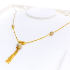 This impressive 22k gold necklace showcases a sleek design with a sophisticated blend of yellow and white gold finishes. Weighing 9.2 grams, it offers a luxurious yet comfortable feel. The combination of yellow and white gold enhances its modern and elegant appeal. With a necklace length of 18 inches and a drop length of 1.5 inches, this piece adds a touch of refined style to any outfit. The secure lobster lock ensures confident and comfortable wear. Elevate your jewelry collection with this exq 22k Gold Necklace, Bridal Jewelry Necklace, Precious Stones Rings, Diamond Pendant Sets, Modern Bracelets, Fancy Necklace, Fancy Rings, Mens Gold Rings, Diamond Necklace Set