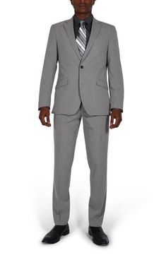 Sleek pinstripes distinguish a suit jacket and pants tailored in a trim fit for refined styling at any occasion. Jacket has notched lapels; four-button cuffs; chest pocket; flap pockets; back vent Lined 69% polyester, 29% rayon, 2% spandex Dry clean Imported Pinstripe Suit With Suit Collar For Office Wear, Classic Pinstripe Suits For Office Wear, Pinstripe Suits With Suit Collar For Work, Notch Lapel Suits With Vertical Stripes For Business Casual, Tailored Pinstripe Suits For Office, Pinstripe Tailored Suits For Office, Pinstripe Single Breasted Suit For Business Casual, Pinstripe Single-breasted Suit For Business Casual, Fitted Business Suits With Vertical Stripes