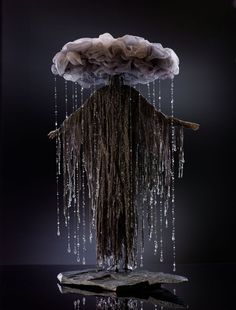 an artistic sculpture with water dripping from it