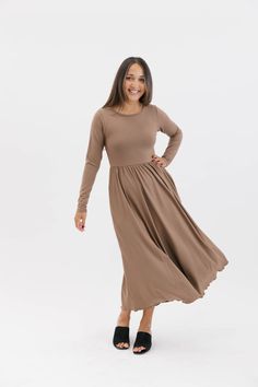 You fell in love with the Camille Romper, so we made it into a dress! This long sleeve, scoop neck midi dress, will be your new closet staple. With inseam pockets and the most beautiful skirt drape, you’ll be twirling through the seasons comfortably and in style! Our best-selling Camille midi dress with long sleeves! Beautiful scoop neckline and waist seam with soft gathers Inseam pockets Midi length - Full body length - 49 1/2" based on size L Fit - true to size Lovingly made in Canada Scoop Neck Midi Dress, Skirt Draping, Maternity Shops, Beautiful Skirts, Fabric Shop, Romper Dress, Rompers Women, Clothes Gift, Scoop Neckline