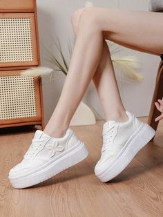 Discover your perfect outdoor companion with our Four-Leaved Clover Lace Thick-Soled Platform Sneakers. These stylish and durable sneakers provide extra support and traction, making them ideal for all your outdoor adventures. Color : White Style : Sporty Toe : Round Toe Strap Type : Lace Up Upper Material : PU Leather Lining Material : Fabric Power Supply : None Size US Ball Girth Foot Length Platform Height EUR36 US6 8.2 9.1 1.4 EUR37 US6.5 8.4 9.3 1.4 EUR38 US7 8.6 9.6 1.4 EUR39 US8 8.8 9.8 1. Breathable Lace-up Sneakers For Spring, Spring Ankle-high Sports Sneakers, Spring Ankle-high Sneakers For Sports, Ankle-high Spring Sneakers For Sports, Spring Sports Sneakers, White Flat Heel Platform Sneakers, Comfortable Spring Platform Sneakers With Flat Heel, Comfortable Round Toe Sneakers For Spring, Ankle-high Synthetic Sneakers For Outdoor Activities