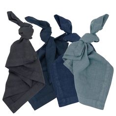 three different colors of scarves on a white background and one is blue, the other has grey