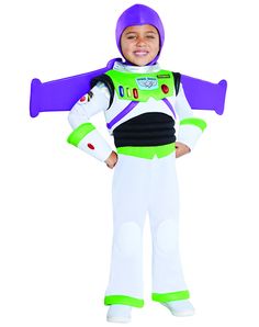 a young boy dressed as buzz lightyear from the movie toy story, standing with his arms out