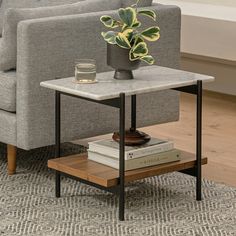 a living room with a gray couch and coffee table