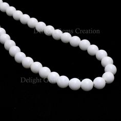 "Product Details : Item Code : DGC080 Gemstone Name : WHITE CORAL Chain Style : BEADED Beads Shape : SMOOTH ROUND Beads Size : 8 MM Approx Length : 18\" Inch Approx Weight : 255 Cts. Approx Customization : **Available** Please Feel Free To Contact If You Have Any Query." Classic White Pearl Necklace With Round Beads, Classic White Jewelry With Polished Beads, White Round Beads For Jewelry Making, Classic White Necklaces With Polished Beads, Classic White Polished Beads Necklaces, Classic White Polished Bead Necklaces, Classic White Pearl Necklace With 8mm Beads, White Round Single Strand Jewelry, White Single Strand Round Jewelry