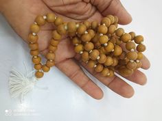 Pure Sandal wood Round bead chanting mala japa mala Prayer mala holy things spritual things. This mala can also be used as a neclace. Sandal is also good for health. Iskcon Mayapur made. Holistic Wooden Beads Mala For Rituals, Holistic Wooden Mala For Rituals, Holistic Healing Mala With Wooden Beads, Spiritual Wooden Beads For Puja, Spiritual Wooden Beads Rosary For Meditation, Spiritual Brown Mala For Healing, Spiritual Rosary With Wooden Beads For Meditation, Spiritual Wooden Beads Mala For Puja, Spiritual Wooden Beads Mala For Meditation