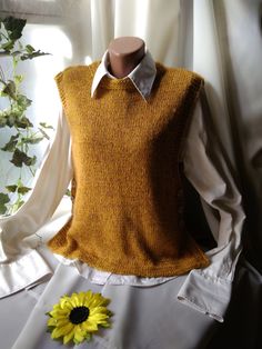 "Hand-knit cover neck sleeveless button alpaca sweater vest. Poncho pullover, Tunic, Tabard.  Boho-style knit sweater. Chest circumference and length of the vest custom order. Chest circumference model 88-96cm(35-38\"inches), length of the cardigan 50cm(20\"). Washing delicately." Mustard Yellow Vest Outfit, Knit Button Sweater Vest For Fall, Knit Sweater Vest With Buttons For Fall, Sleeveless Knit Sweater Vest With Buttons, Sleeveless Buttoned Sweater Vest For Fall, Casual Knitted Sweater Vest For Fall, Cozy Knitted Vest For Fall, Casual Knit Sweater Vest For Fall, Knit Sleeveless Sweater Vest For Fall