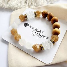 This elegant boho stretch bracelet combines frosted white and star cut yellow tea cherry quartz beads. It includes gold plated hematite spacer beads that perfectly complement the white frosted opaque rondelle and star cut quartz gemstones. Unique Australian made and designed jewellery piece.   Natural Sandalwood beads incorporated into this design are  perfect for infusing your favorite essential oils. Simply add a few drops of your preferred oil onto the wood beads, and experience the rejuvenat Handmade Gifts For Girlfriend, Wood Beads Jewelry, Yellow Tea, Wood Bead Bracelet, Quartz Bracelet, Beaded Bracelets Diy, Beaded Jewelry Diy, Gemstone Bracelet, Crystal Bracelets