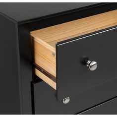 a black and wood dresser with two drawers