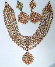 "Classic Vintage elegant 20 carat solid gold, Old cut Diamonds and coloured stones with multicolor Enamel work 5 rows necklace (Kundan Meena choker) with Matching Earrings. Ideal for any occasions A good size necklace with many stands of clear diamonds, great craftmanship. Length of necklace -23 cm (9.05) Size could be adjusted according to your requierment by adding adjustable cord. Width of Center piece-9 cm (3.15\"), total weight of set 141.450 Grams(4.99 ounce). Length of earrings-7 cm,width Multicolor Formal Jewelry For Diwali, Formal Multicolor Meenakari Jewelry, White Motif Jewelry For Diwali, Multicolor Jewelry For Formal Festivals, Diwali White Motifs Jewelry, Multicolor Formal Jewelry For Festivals, Multicolor Chandbali Jewelry For Festivals, Formal Multicolor Kundan Necklaces, White Temple Jewelry With Motifs