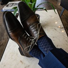 A beautiful deep blue men's dress sock with a contrasting diamond pattern. Simple but unique. All of our socks are crafted utilizing the 200 needle count knitting process, our signature material blend and a custom-built ribbed cuff. 100% satisfaction money back guarantee and free standard shipping on all orders! White Pocket Square, Over The Calf Socks, Blue Diamonds, Brown Dress Shoes, Styling Guide, Dress With Stockings, Mens Dress Socks, Pattern Simple, Blue Socks