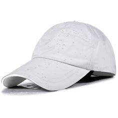 a white baseball cap with holes on the front and side, sitting against a white background