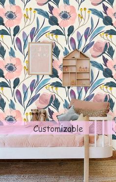 a child's bedroom with floral wallpaper