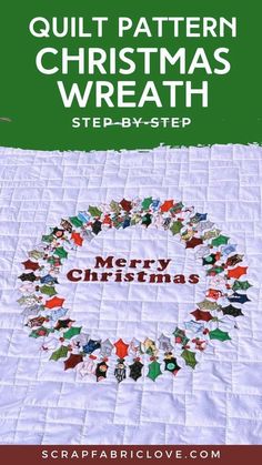 a quilted christmas wreath with the words merry christmas written in red, green and white