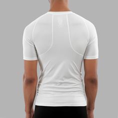 Discover the Ultimate Comfort with Our Basic White Compression Shirt If you're an athlete or fitness enthusiast, our sleeveless compression shirt is an essential addition to your workout wardrobe. Designed for optimal performance, this shirt not only protects your skin from harmful sun rays but also ensures you stay cool as you break a sweat outdoors. Crafted from moisture-wicking material, this men’s sleeveless compression shirt is available in classic black and pristine white. Its breathable a White Compression Shirt, Sleeveless Compression Shirt, Compression Shirt, White Sleeveless, Keep Your Cool, Black Sleeveless, Breathable Fabric, The Sun, Benefits