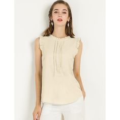 The ruffled sleeveless design would show demure, feminine grace, and also lend shape and texture. Crafted from a lightweight material, it is shaped with an elegant crew neckline, and pleat detailing, and comes in a relaxed cut for easy, breezy wear. This vintage blouse is designed with ruffled trim and solid color, especially for a professional look at work. Office Vintage, 1950s Retro, Eyelet Blouse, Ruffle Fabric, Work Blouses, Vintage Blouse, Women's Blouses, Polka Dot Blouse, Hem Style